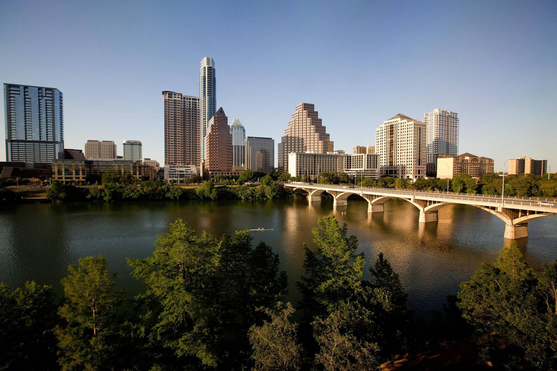 Downtown Austin skyline and Lady Bird Lake in late-afternoon light